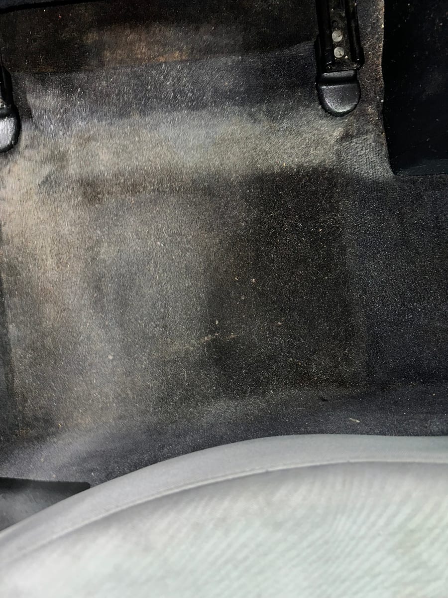 Hyundai Elantra carpet heavily soiled before detailing