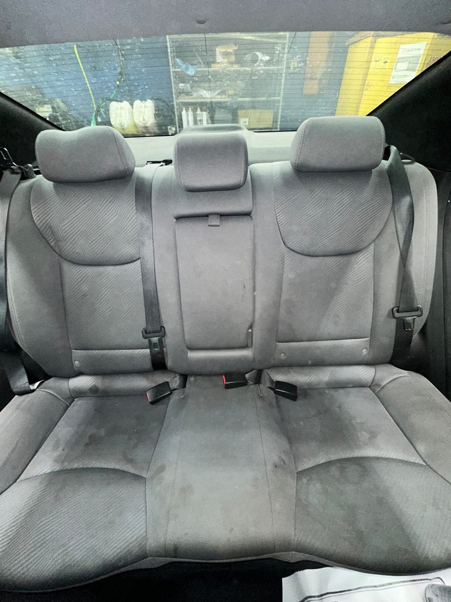 Hyundai Elantra fabric rear seats heavily soiled before detailing